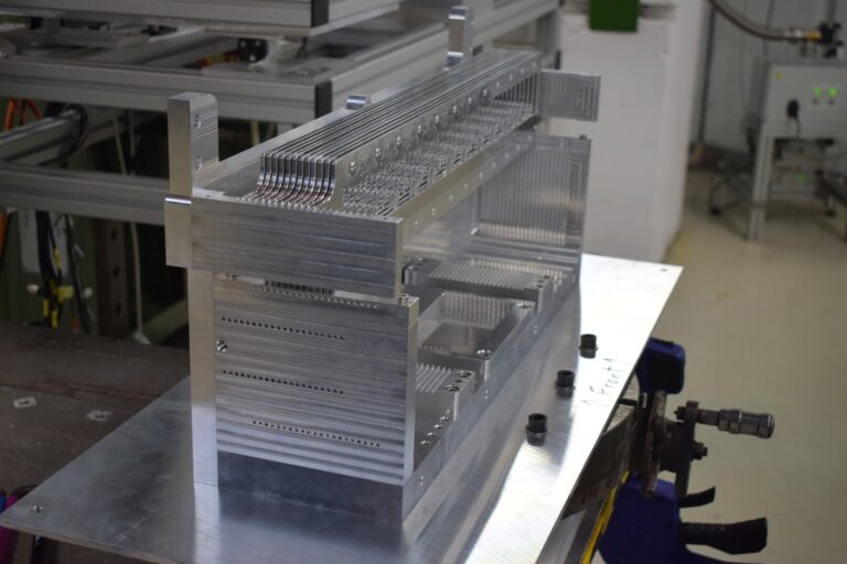 The detector housing with the 12 T-Frames (support for electronics and sensors) installed. The full stack is manufactured in DURAL, by the Warsaw University.